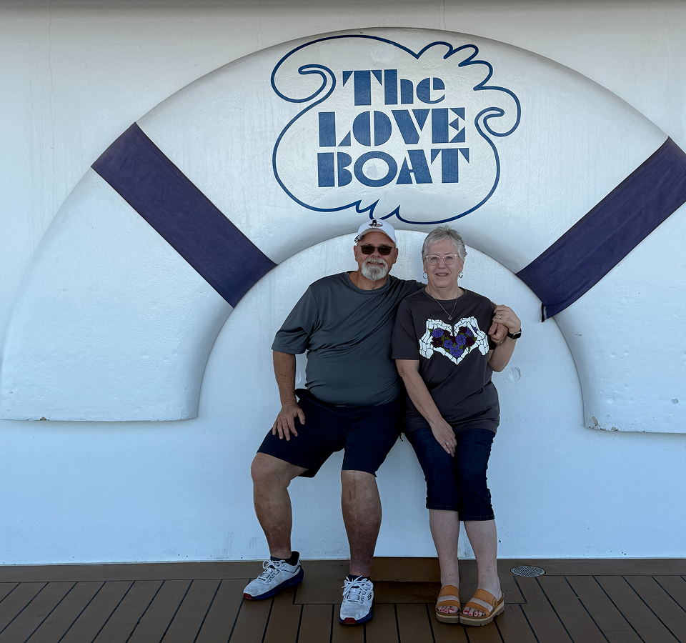 Smiling pair in nautical setting